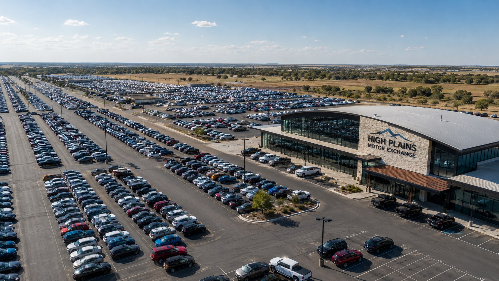 Aerial view of an auto auction lot filled with vehicles